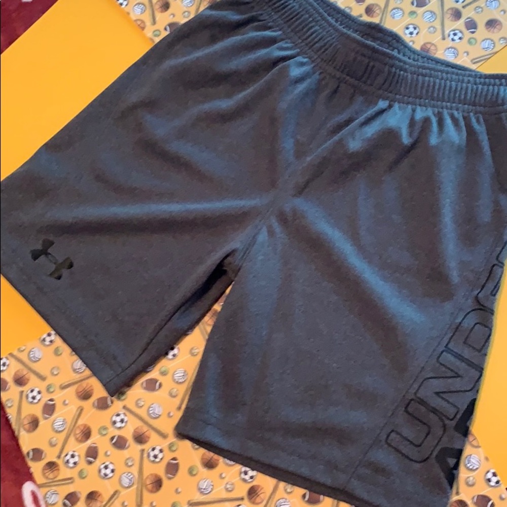 Little boy under Armour shorts